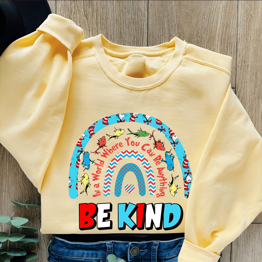 Léigh ar fud Mheiriceá T-léine, Bí Kind, Tee Lae Léitheoireachta, Léine Scoile 100 Lá, Geansaí Óige Lá Léitheoireachta, Saol an Mhúinteora, léine cat sa hata