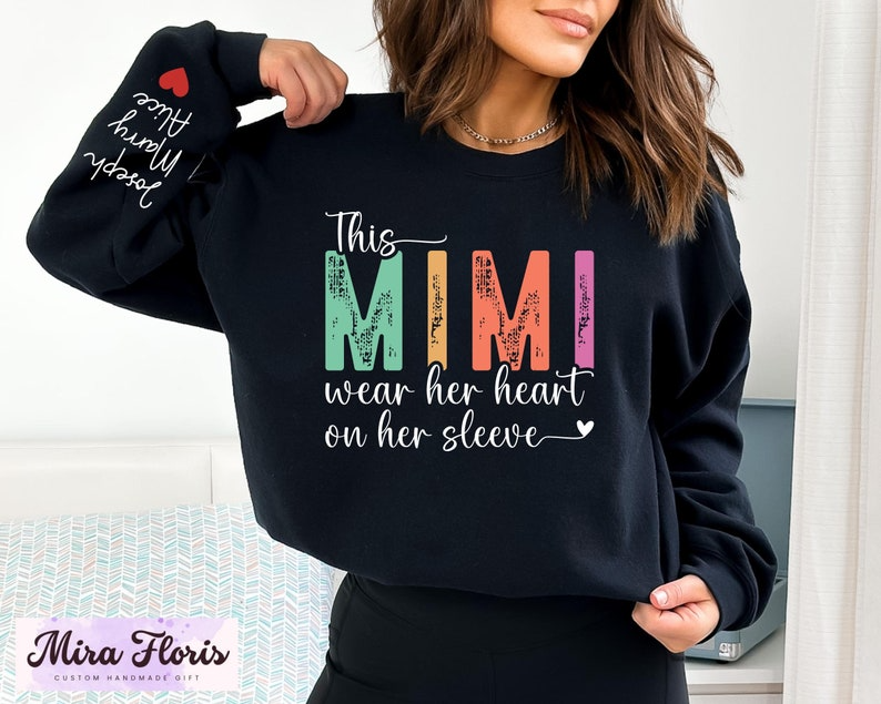 This Mimi Wear Her Heart On Her Sleeve Mimi Sweatshirt, Custom Mimi Sweatshirt With Kids Name, Nana Gift Hoodie, Kids Name on Sleeve