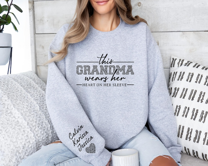 Custom Grandma Sweatshirt, This Grandma Wears Her Heart On Her Sleeve Sweater, With Kids Name On Sleeve, Grandma Sweater,Custom Grandma Gift