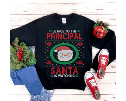 Be Nice To The Principal Santa Is Watching Funny Ugly Christmas Sweatshirt, Elementary School Principal Holiday Shirt Unisex Heavy Blend Cr