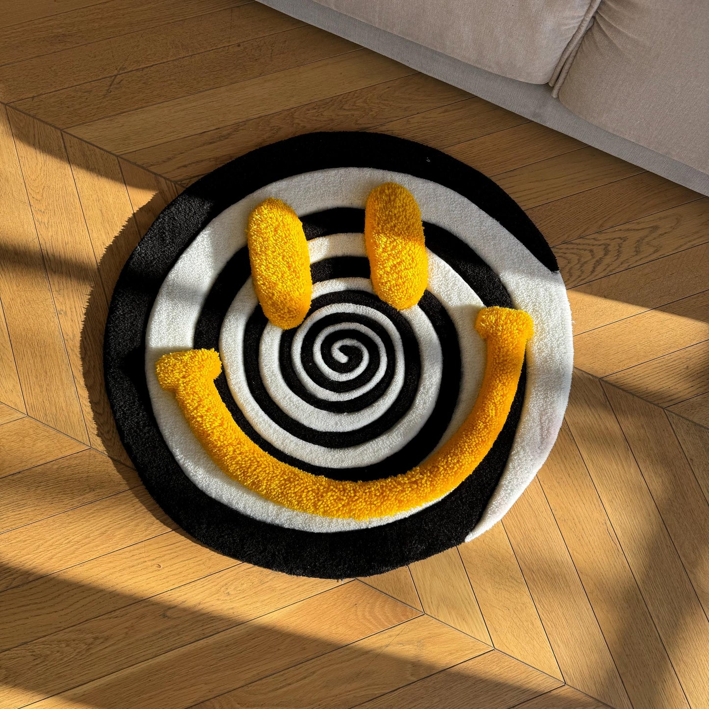 Handmade Tufted Smiley Face Rug: Hypnotic Spiral Design