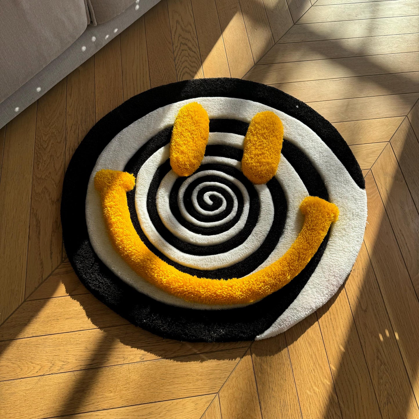 Handmade Tufted Smiley Face Rug: Hypnotic Spiral Design