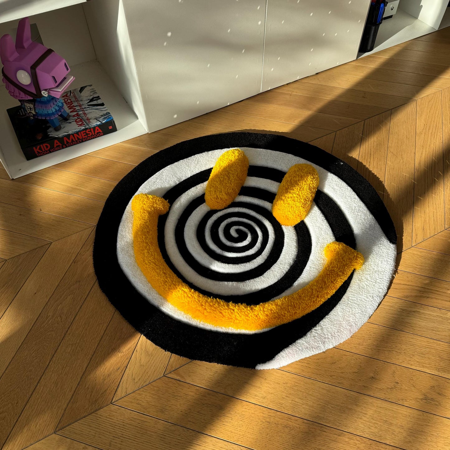 Handmade Tufted Smiley Face Rug: Hypnotic Spiral Design