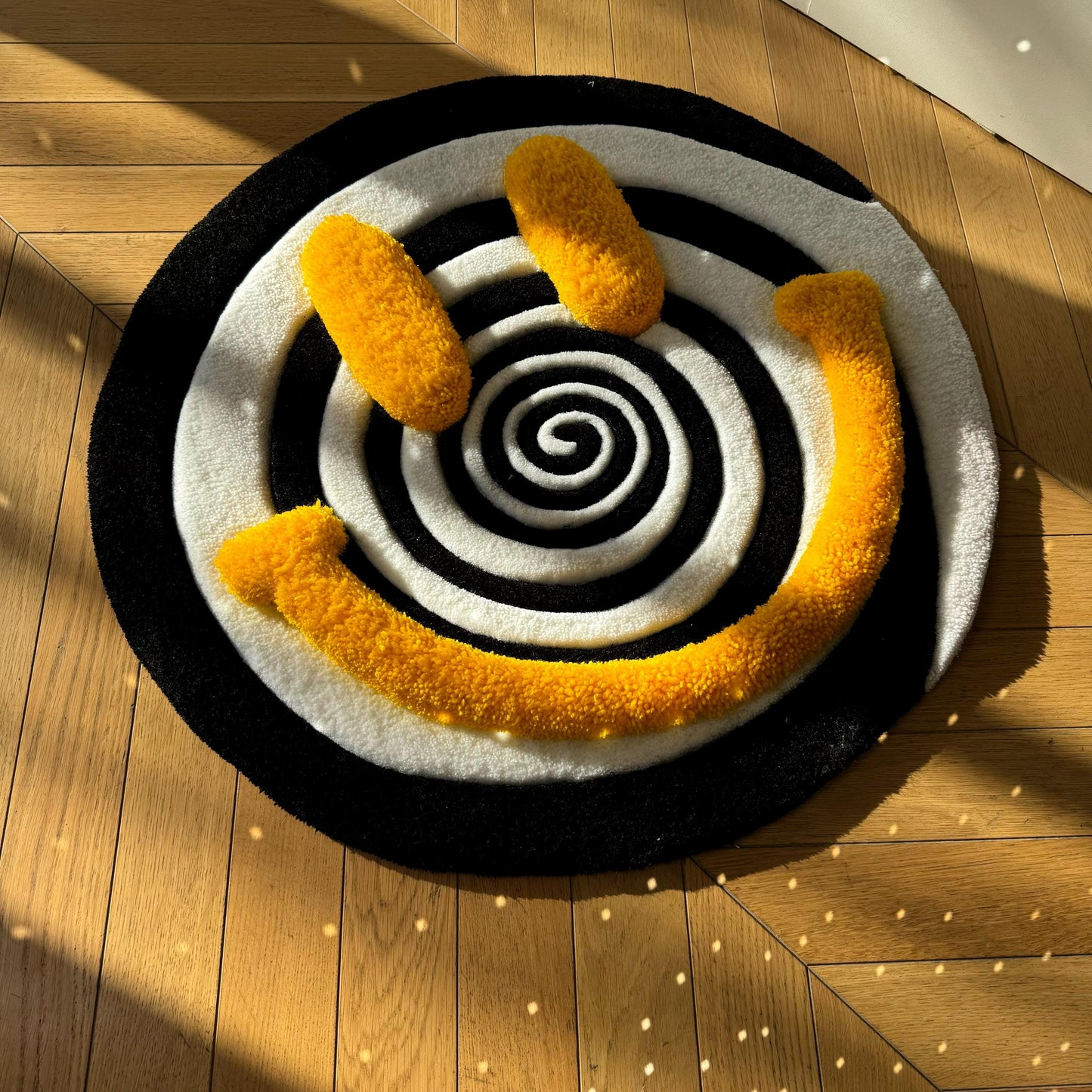 Handmade Tufted Smiley Face Rug: Hypnotic Spiral Design