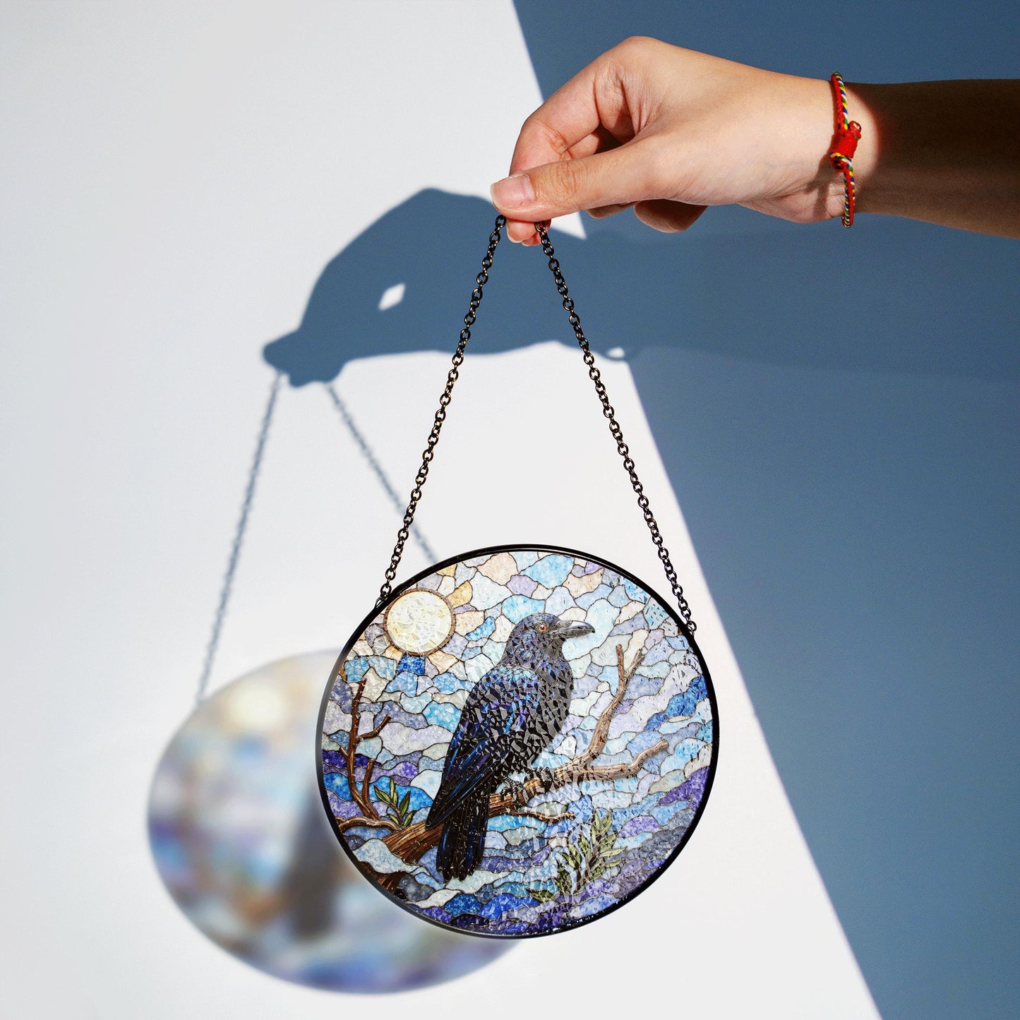 raven on branch in mosaic forest stained glass suncatcher gift for nature lovers