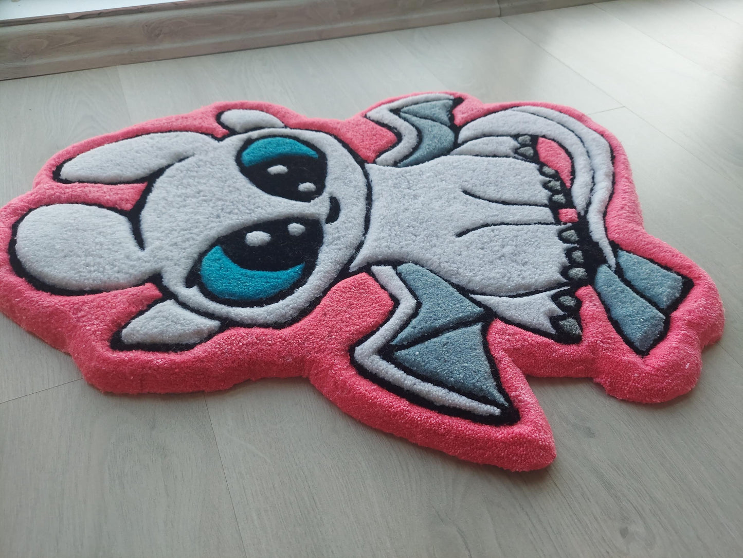 Hand Tufted Dragon Rug for Kids Room – Cute White Cartoon Dragon Mat with Blue Eyes – Soft Tufted Nursery Decor or Gift Idea