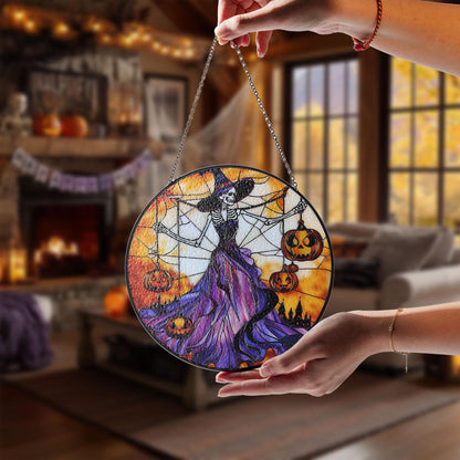 Gothic Halloween Stained Glass Suncatcher – Skeleton Witch in Purple Dress Holding Jack-o'-Lanterns with Spider Web and Haunted Castle
