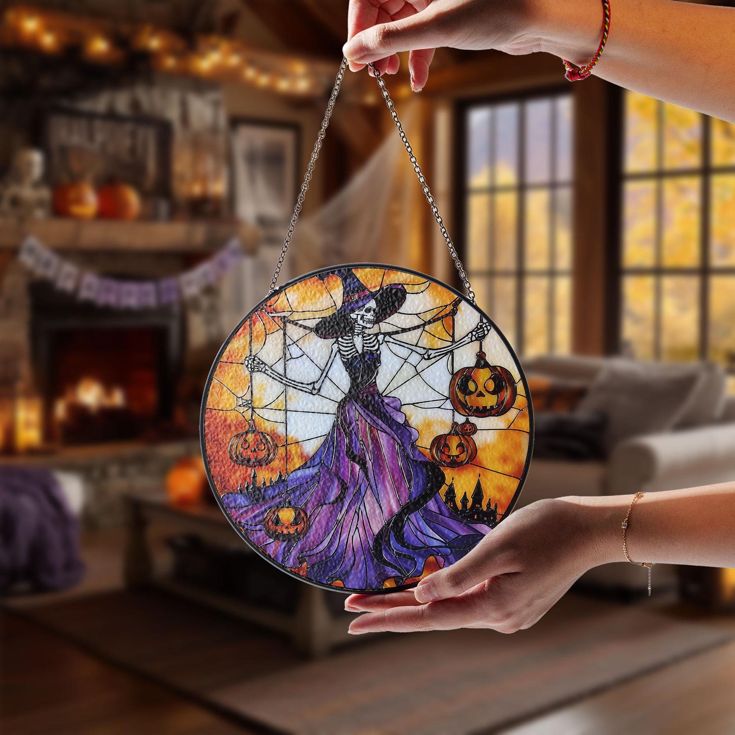 Gothic Halloween Stained Glass Suncatcher – Skeleton Witch in Purple Dress Holding Jack-o'-Lanterns with Spider Web and Haunted Castle