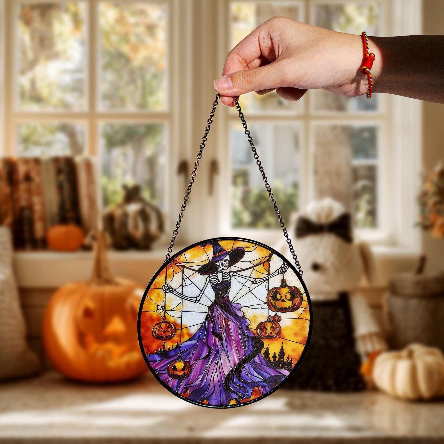 Gothic Halloween Stained Glass Suncatcher – Skeleton Witch in Purple Dress Holding Jack-o'-Lanterns with Spider Web and Haunted Castle