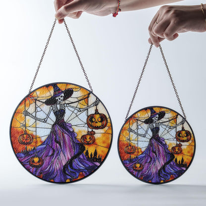 Gothic Halloween Stained Glass Suncatcher – Skeleton Witch in Purple Dress Holding Jack-o'-Lanterns with Spider Web and Haunted Castle