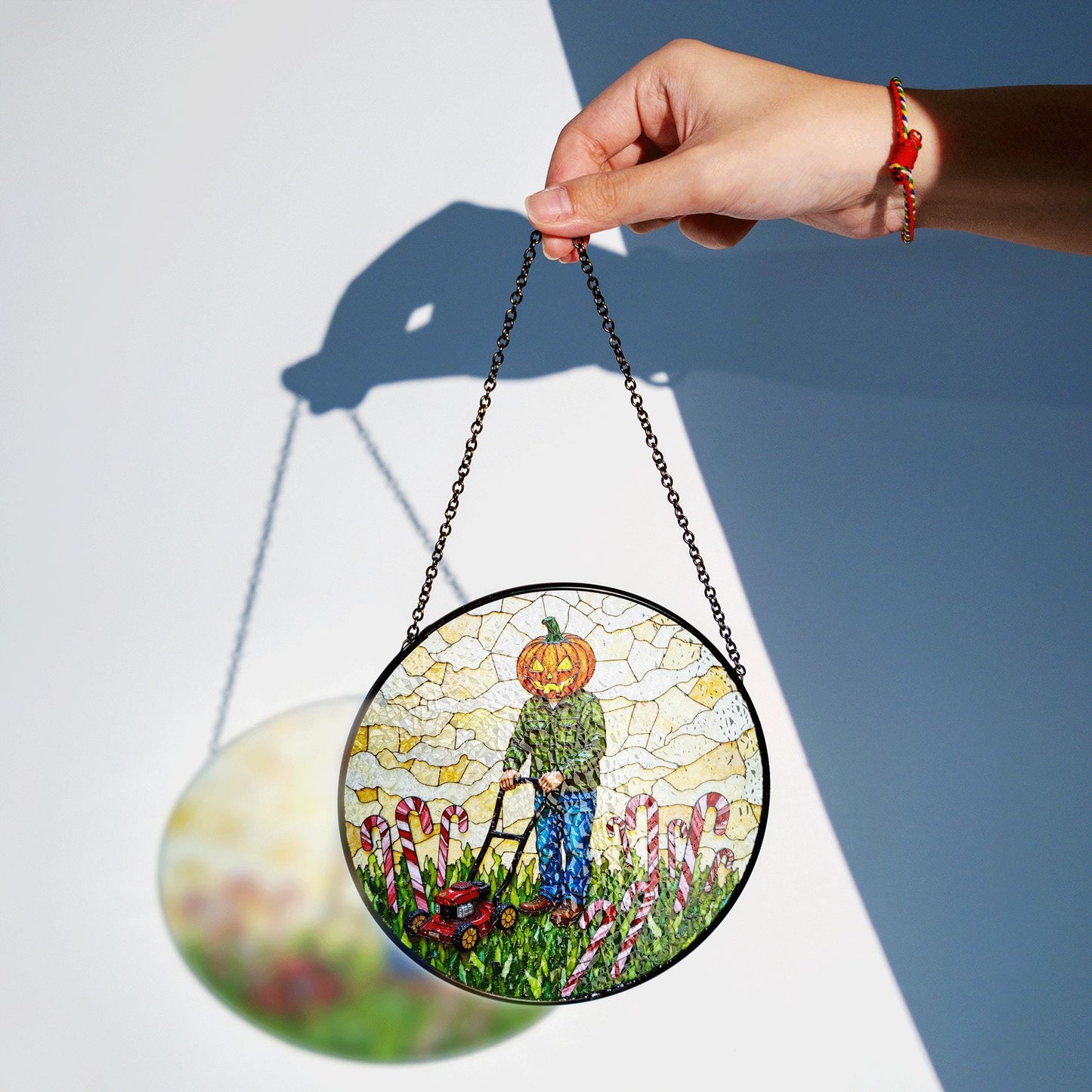 suncatcher stained glass pumpkin head man mowing candy cane field Halloween gift Christmas gift