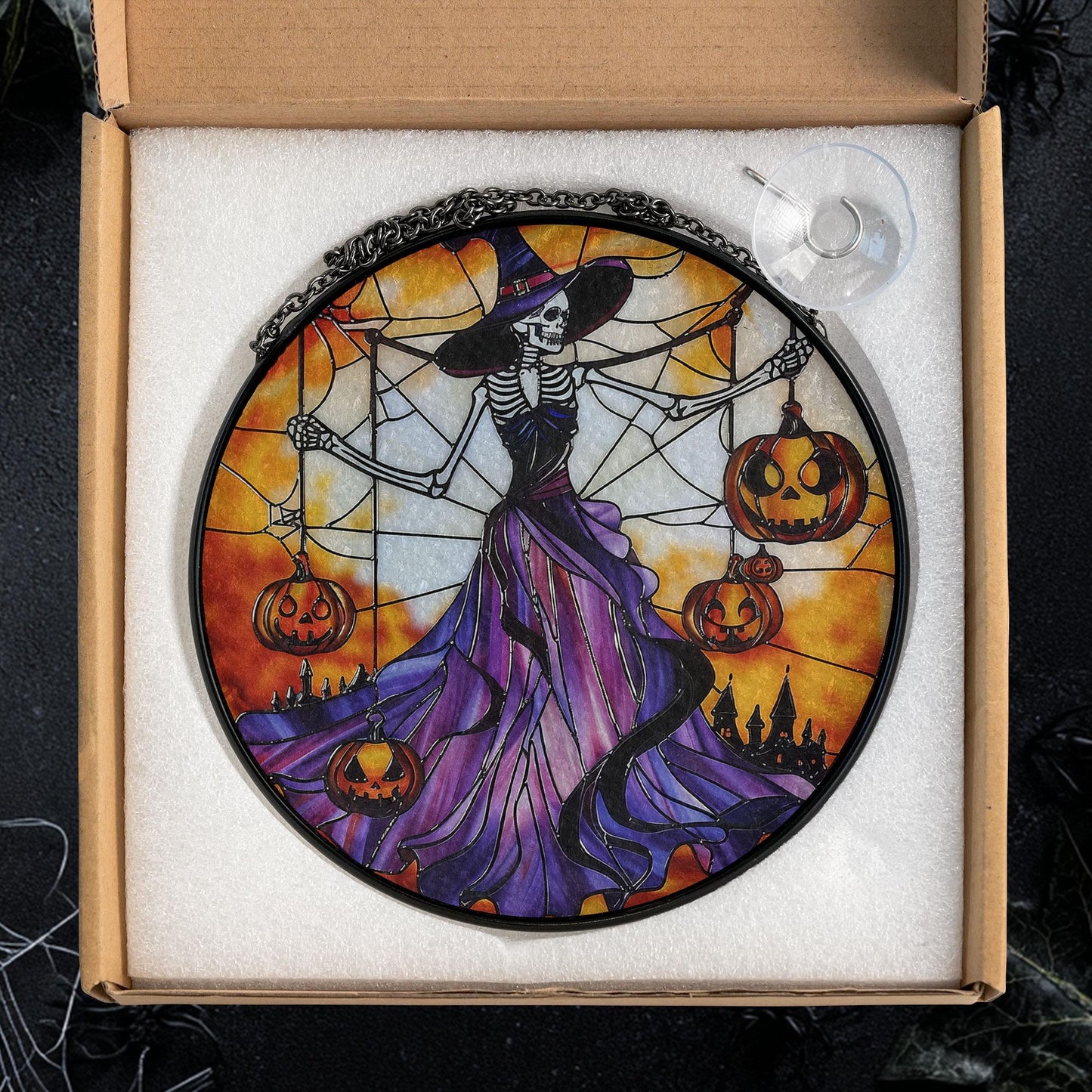 Gothic Halloween Stained Glass Suncatcher – Skeleton Witch in Purple Dress Holding Jack-o'-Lanterns with Spider Web and Haunted Castle