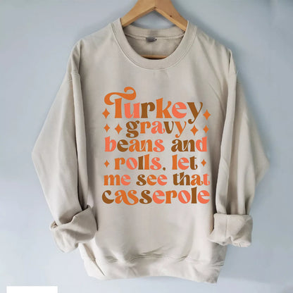 Pónairí agus Rollaí Gravy na Tuirce Lig dom a fheiceáil go bhfuil geansaí casserole, léine na Nollag, geansaí Nollag gleoite, geansaí gheimhridh na Nollag