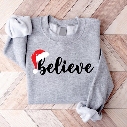 Believe Christmas Sweatshirt, Merry Christmas Shirt, Christmas Party Sweatshirt, Winter Sweatshirt,Christmas Family Gift, Holiday Sweatshirt