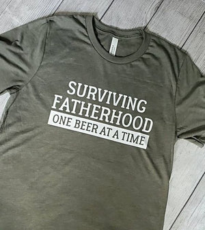 Surviving Fatherhood one beer at a time, funny dad shirt, dad beer shirt